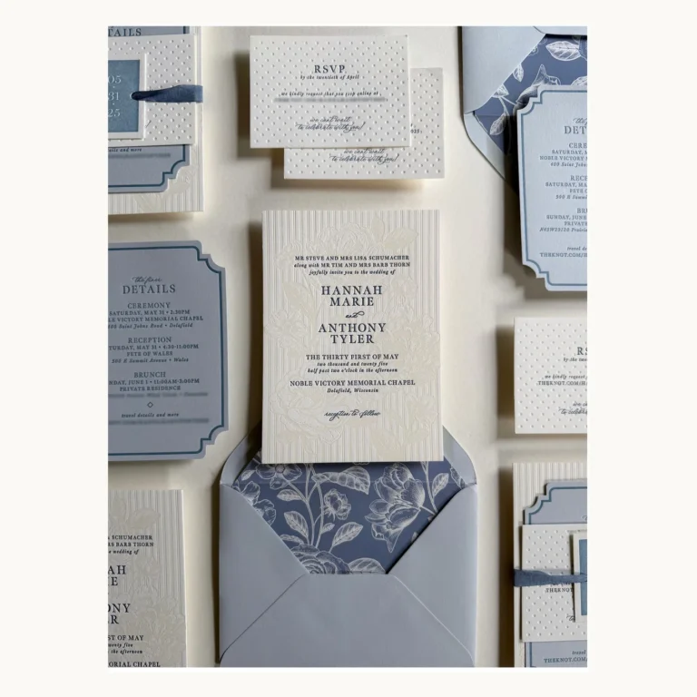 Photograph of Blue and White Floral Letterpress Wedding Invitations