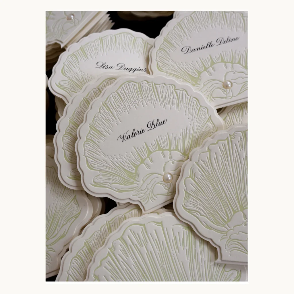 Photograph of Shell and Pearl Wedding Place Cards