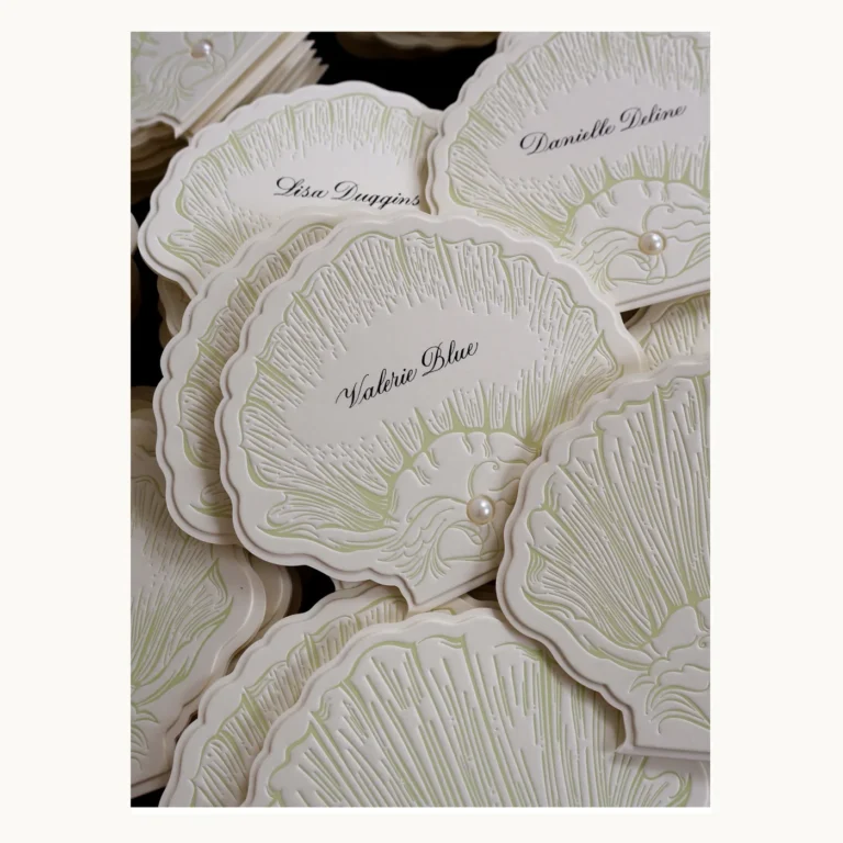 Photograph of Shell and Pearl Wedding Place Cards