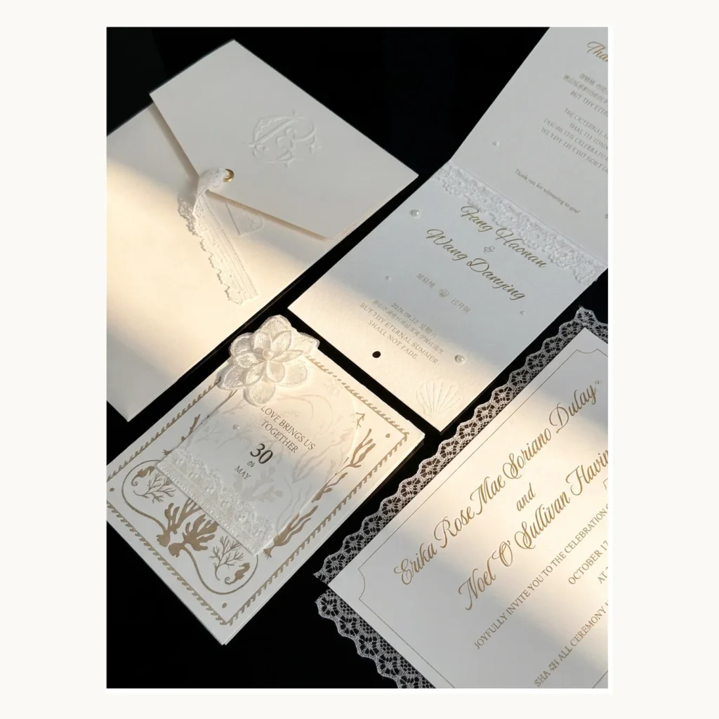 Photograph of Ivory Embossed Floral Wedding Invitations