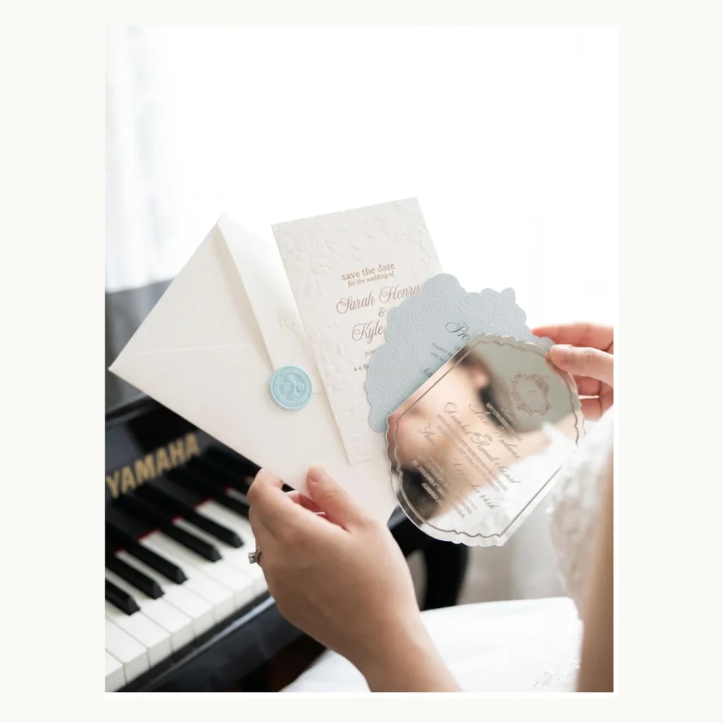 Photograph of Blue Scalloped Acrylic Wedding Invitations