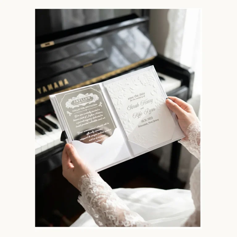 Photograph of Black and Gold Acrylic Wedding Invitations