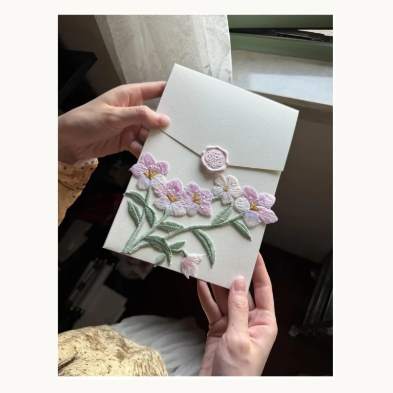 Photograph of Orchid Embellished Wedding Invitations