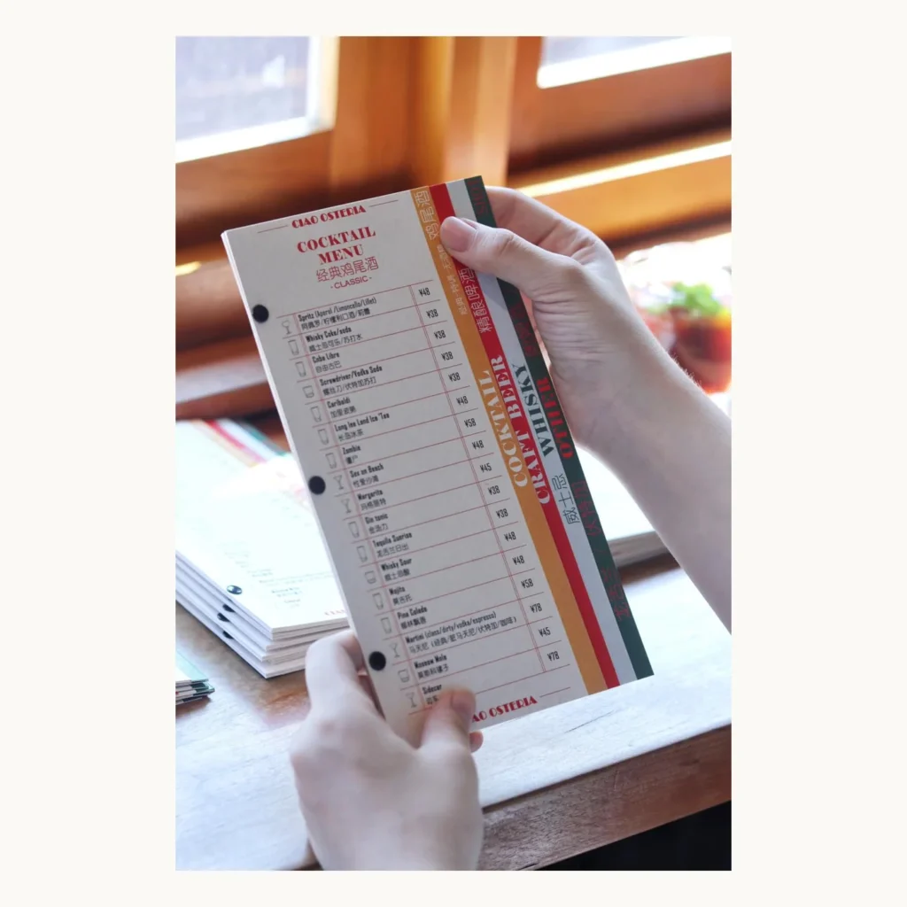 Photograph of Dragon-Scale Bound Bar Drinks Menu