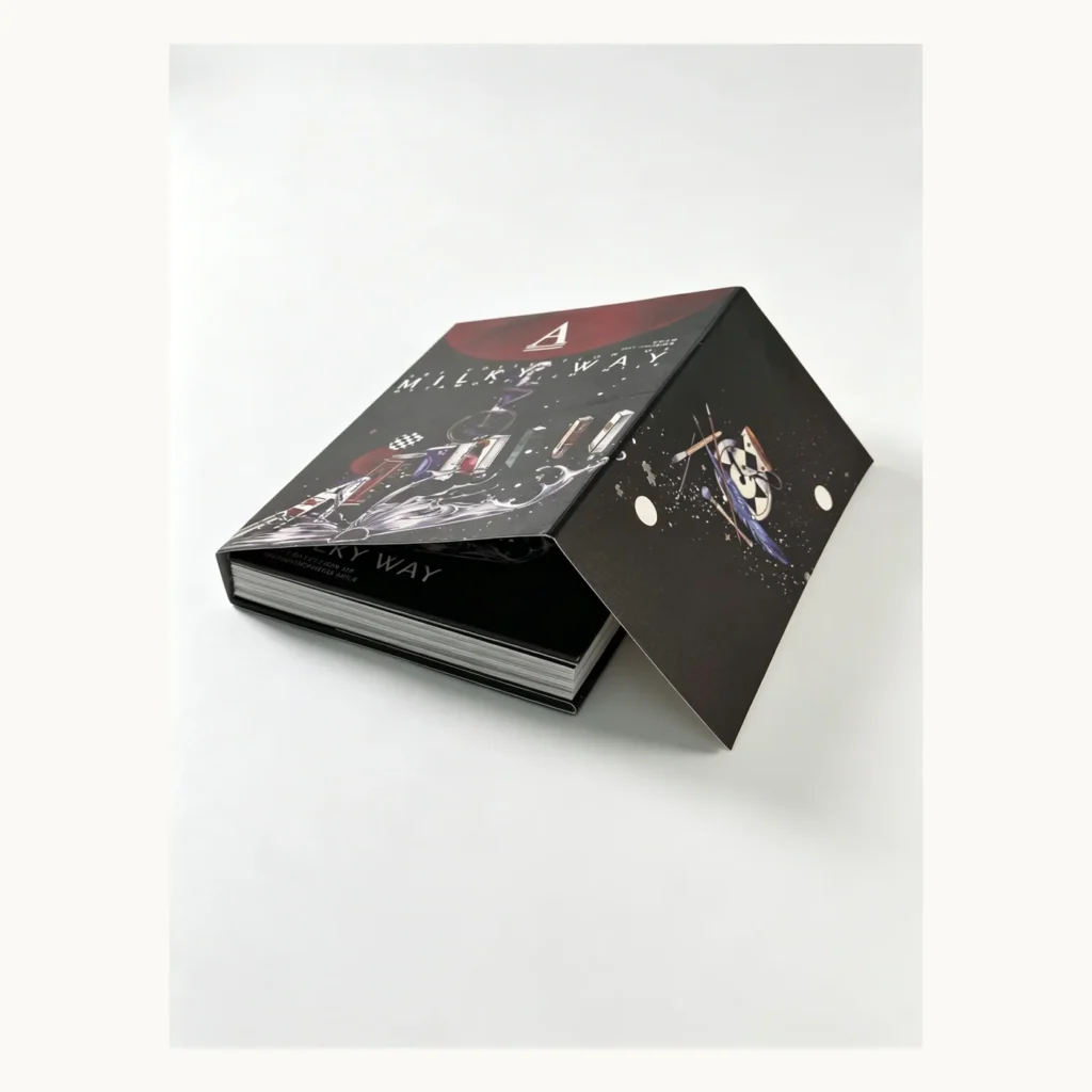 Photograph of Dark Exposed-Spine Sewn Comic Art Book