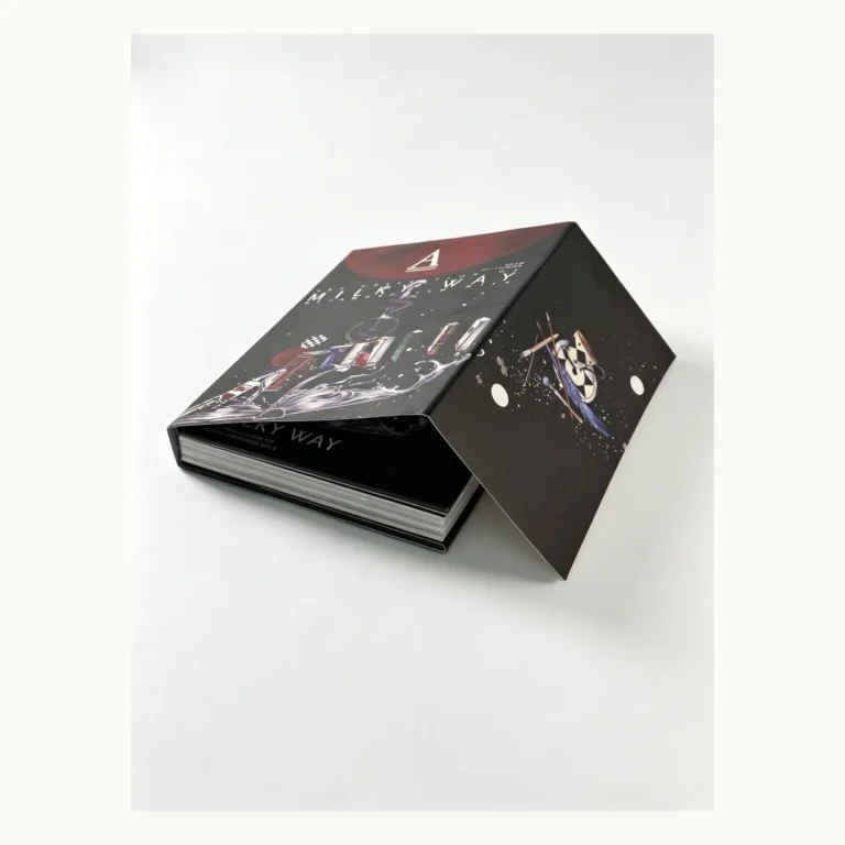 Photograph of Dark Exposed-Spine Sewn Comic Art Book